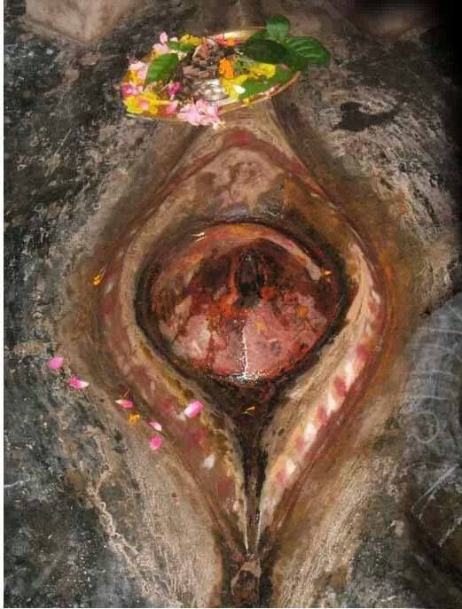 Natural rock yoni cleft at Kamakhya Temple